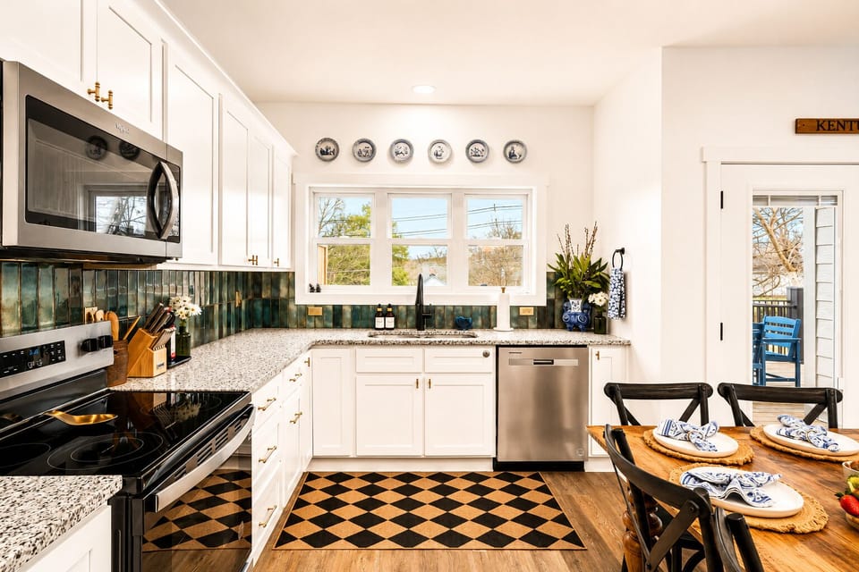 Bright modern kitchen with everything you need to make a gourmet meal.