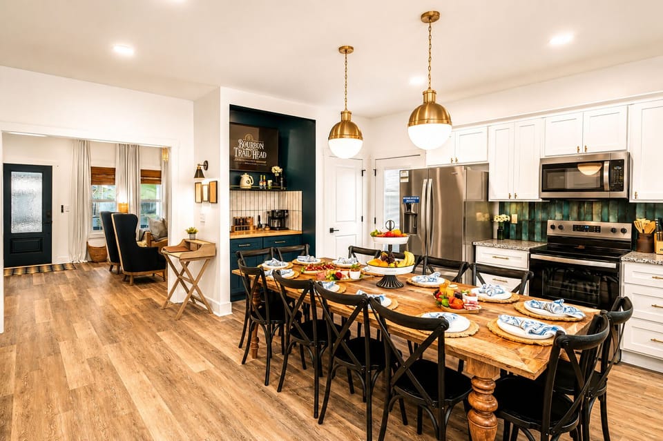 Spacious farmhouse dining area with chef’s kitchen and seating for 12.