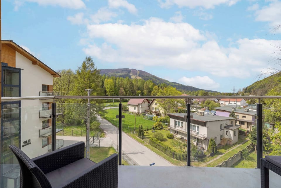 The balcony provides a perfect spot for enjoying the fresh air.