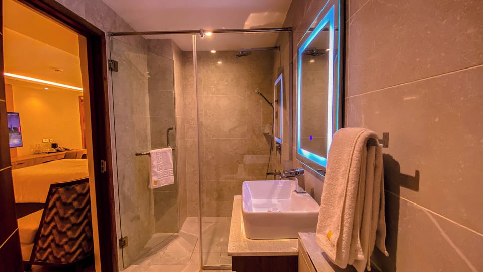 Hair dryer, slippers, towels, soap