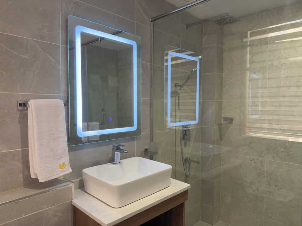 Hair dryer, slippers, towels, soap