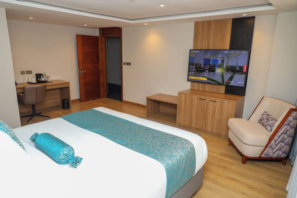 Executive Suite, City View | In-room safe, desk, laptop workspace, iron/ironing board