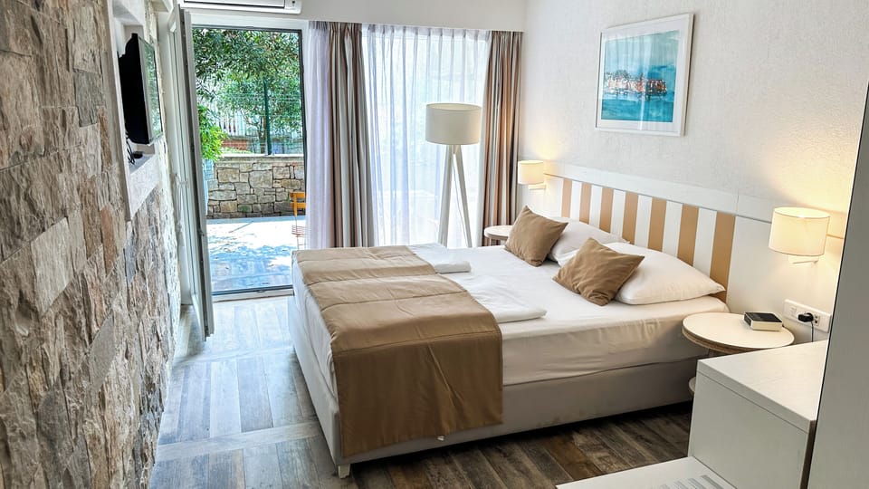 Standard Double or Twin Room, Balcony | Minibar, in-room safe, desk, free WiFi