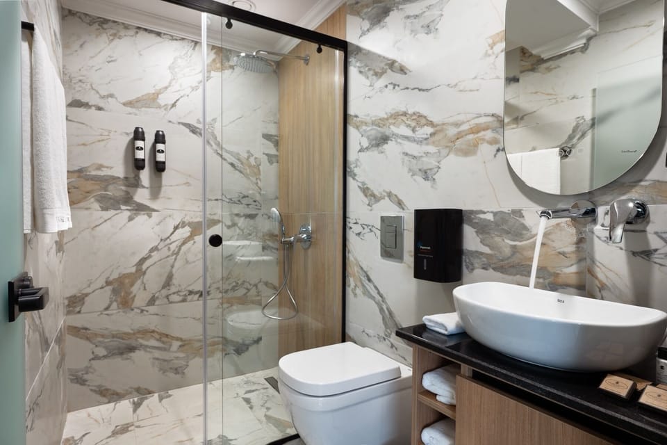 Shower, free toiletries, hair dryer, towels