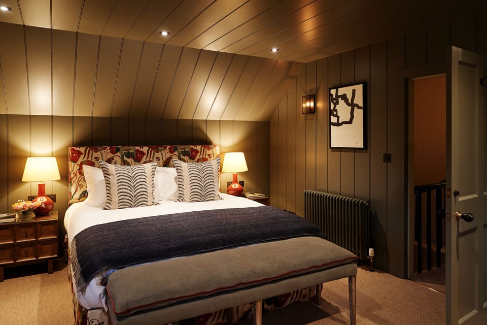 The fully panelled open plan master bedroom