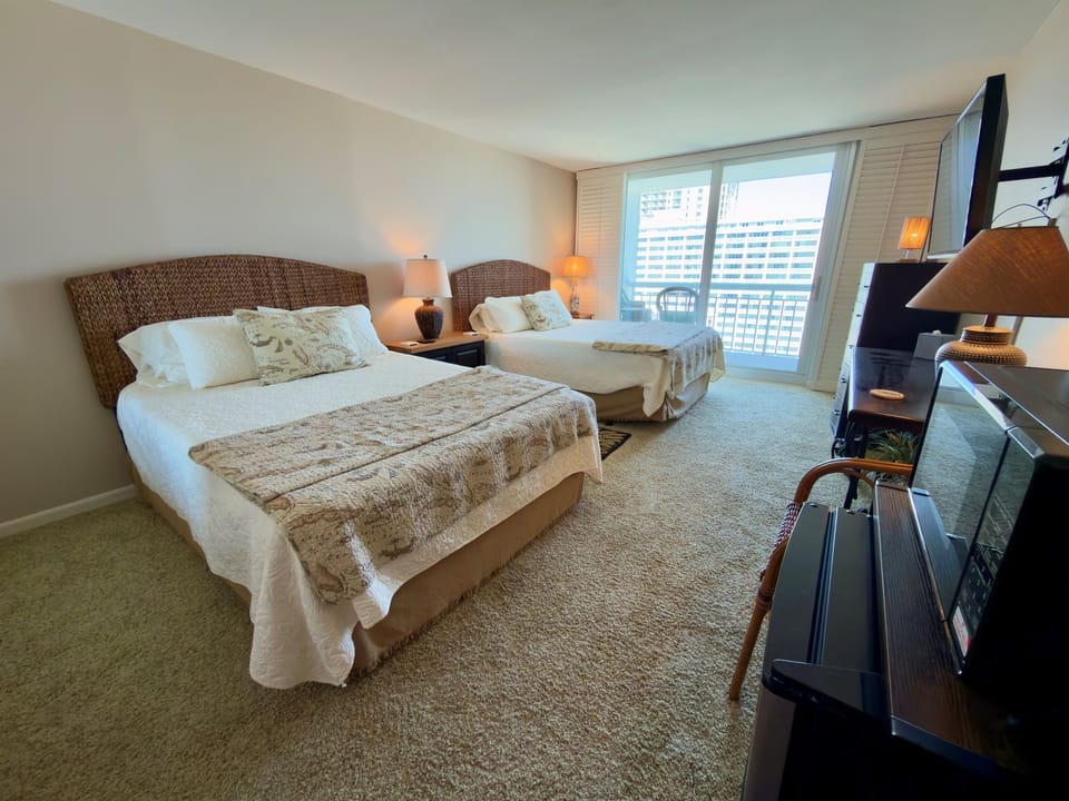 Two Queen Beds In Bedroom