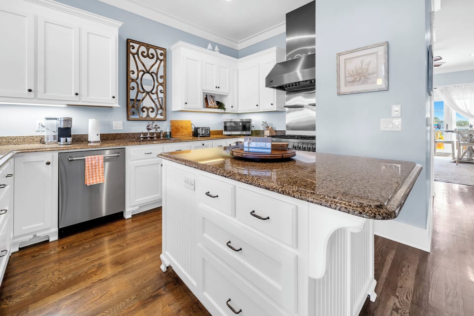 Your gourmet kitchen features granite countertops, premium appliances, and plenty of space to create memorable meals during your stay.