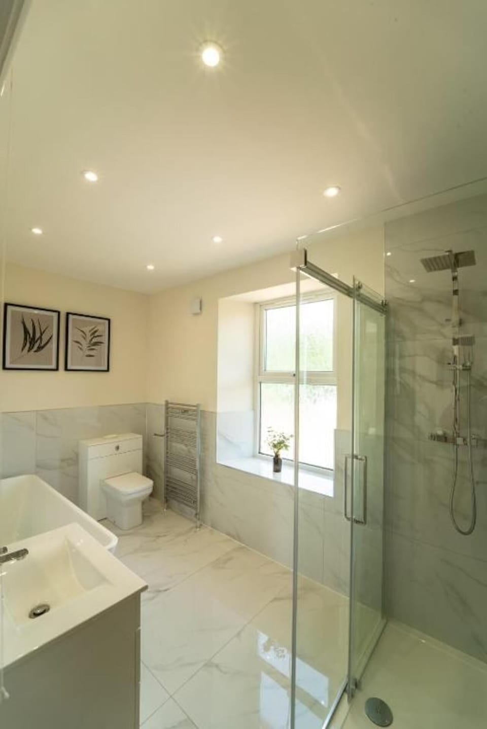 Separate tub and shower, deep soaking tub, hair dryer, towels