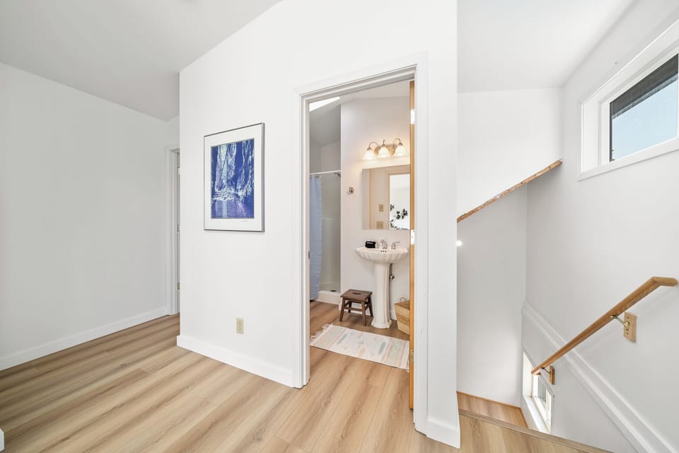 Upstairs full bath off of the family room with walk in shower