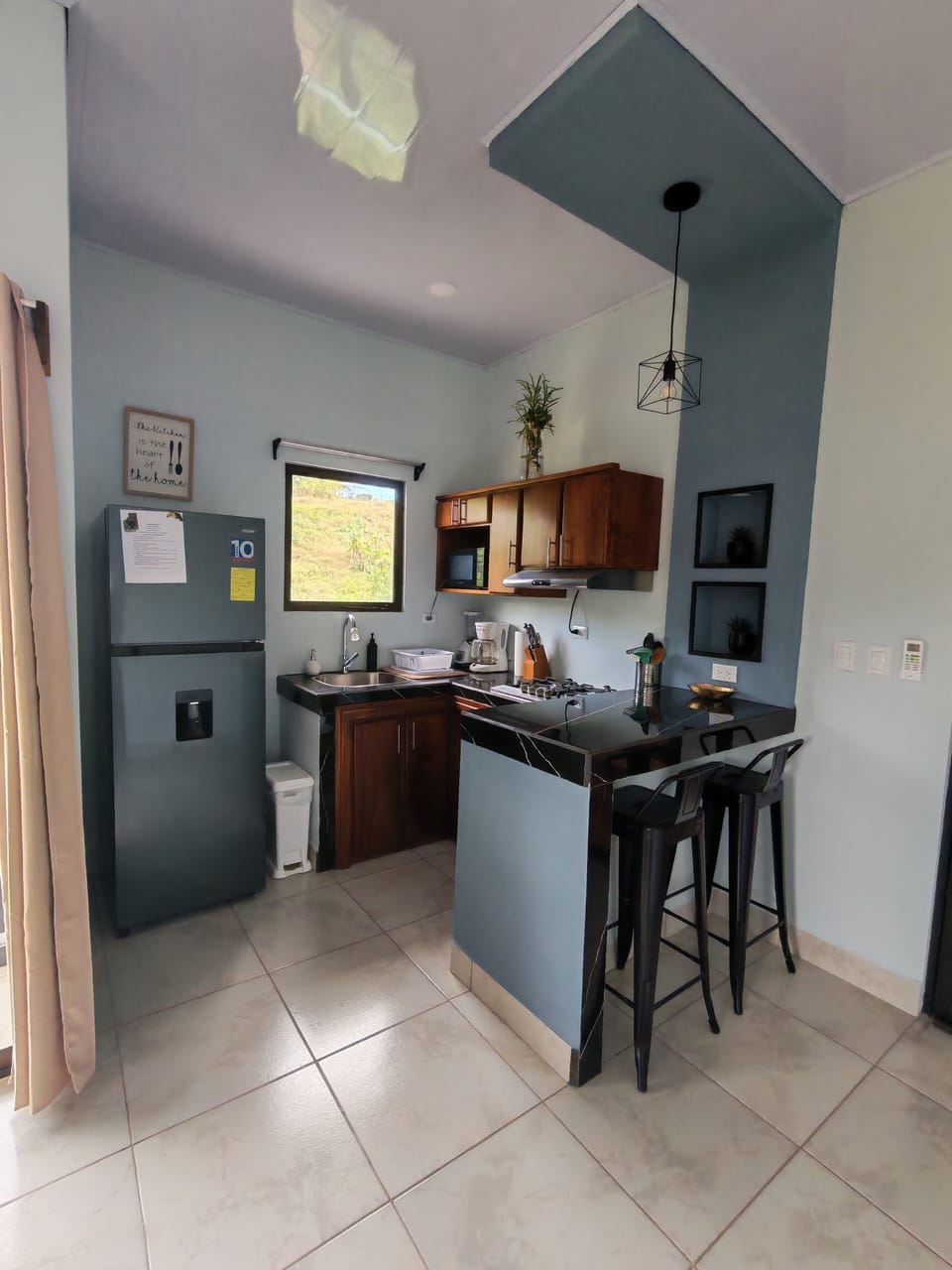 Basic Triple Room, Mountain View | Private kitchen | Fridge, microwave, stovetop, toaster