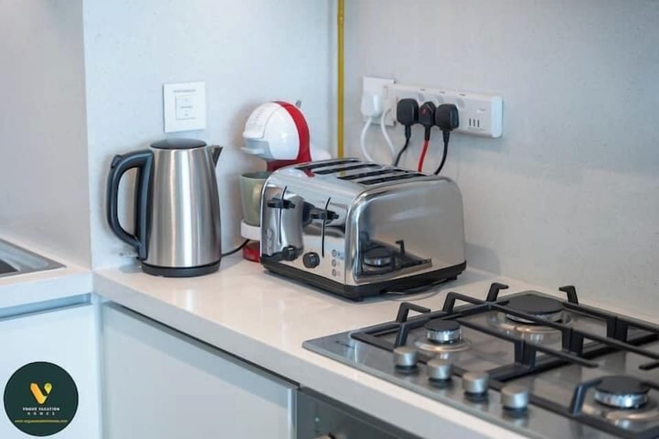 Luxury Apartment, Balcony, City View | Private kitchen | Full-size fridge, microwave, oven, stovetop
