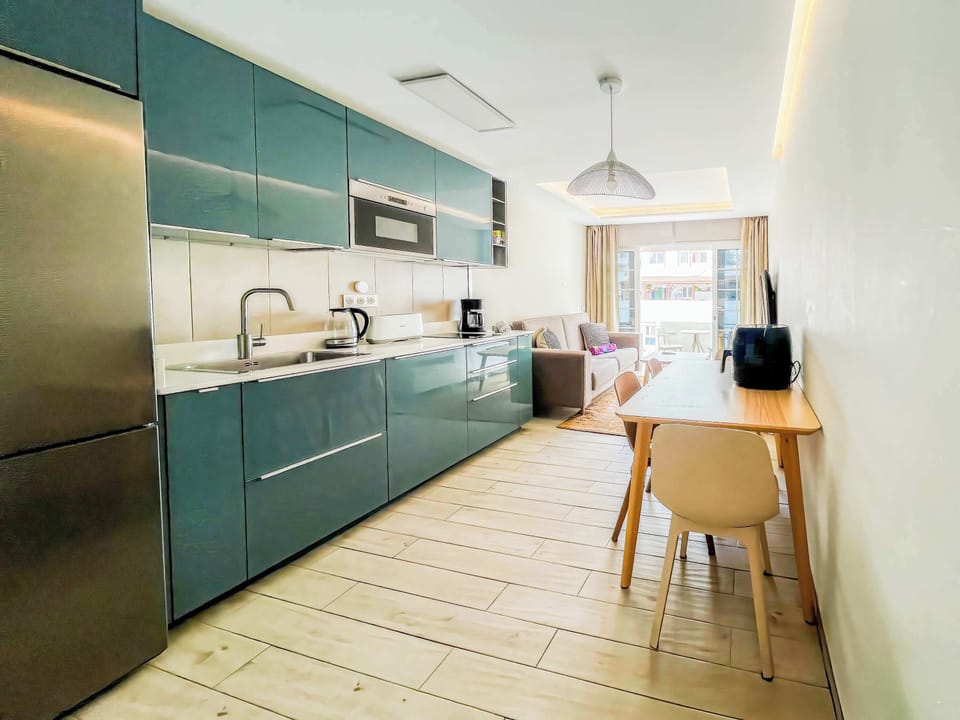 The brand-new, fully equipped kitchen includes a hob, coffee machine, freezer, and everything needed for a relaxed self-catering stay