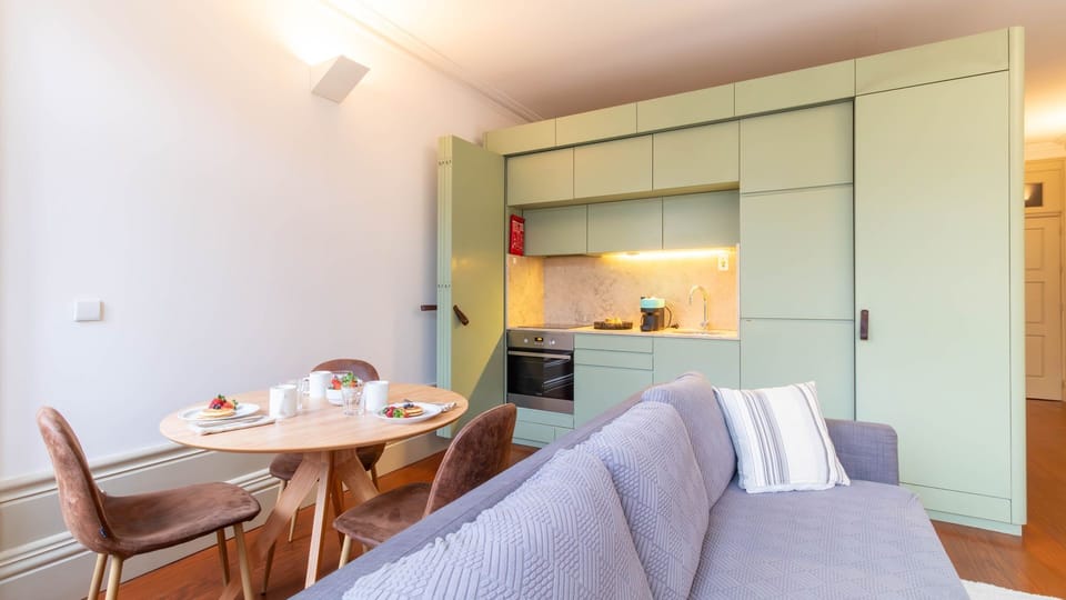 Modern kitchenette and dining area, perfect for a casual meal or coffee.. #KitchenInspo #CityLiving