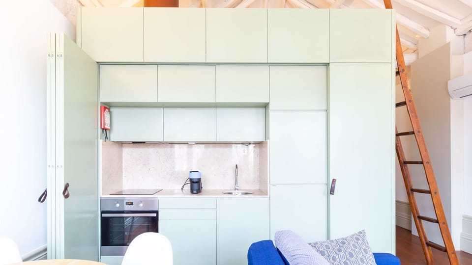 Simple yet modern kitchenette setup with a sleek design. #KitchenInspo #ModernComfort