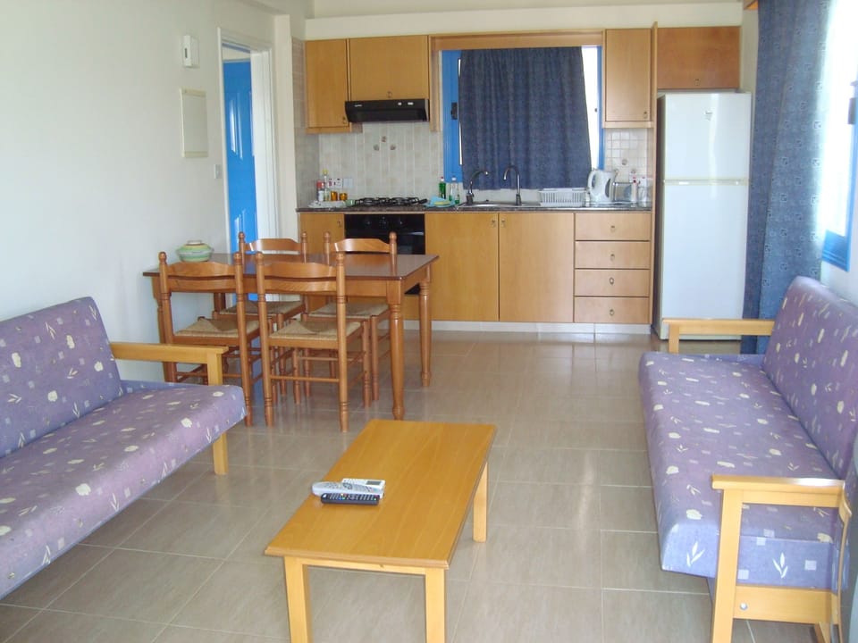 Apartment, Balcony, Sea View | Living area | Flat-screen TV, table tennis
