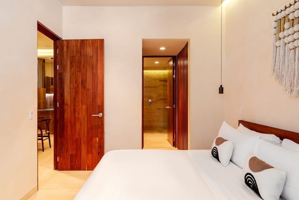 Drift off comfortably in a tranquil suite with minimalist style.