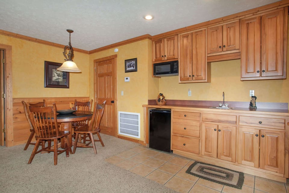 Host game night in the dedicated game room featuring a pool table and scenic mountain views.