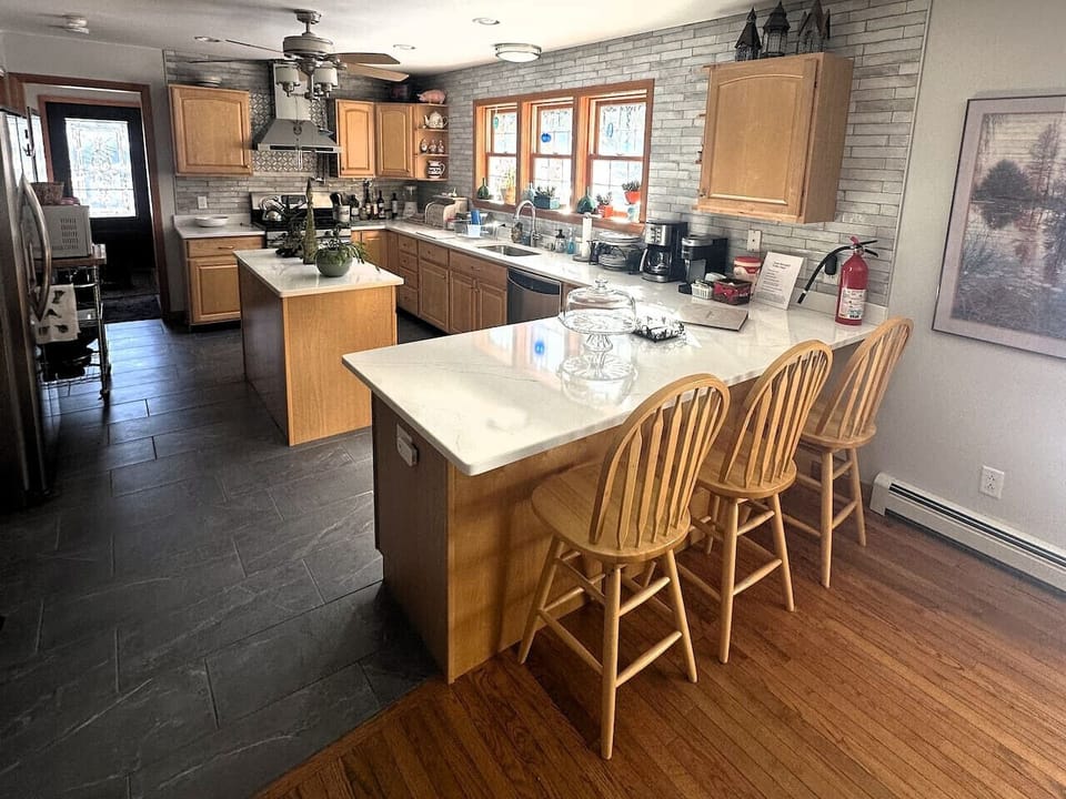 Spacious island with seating for three.