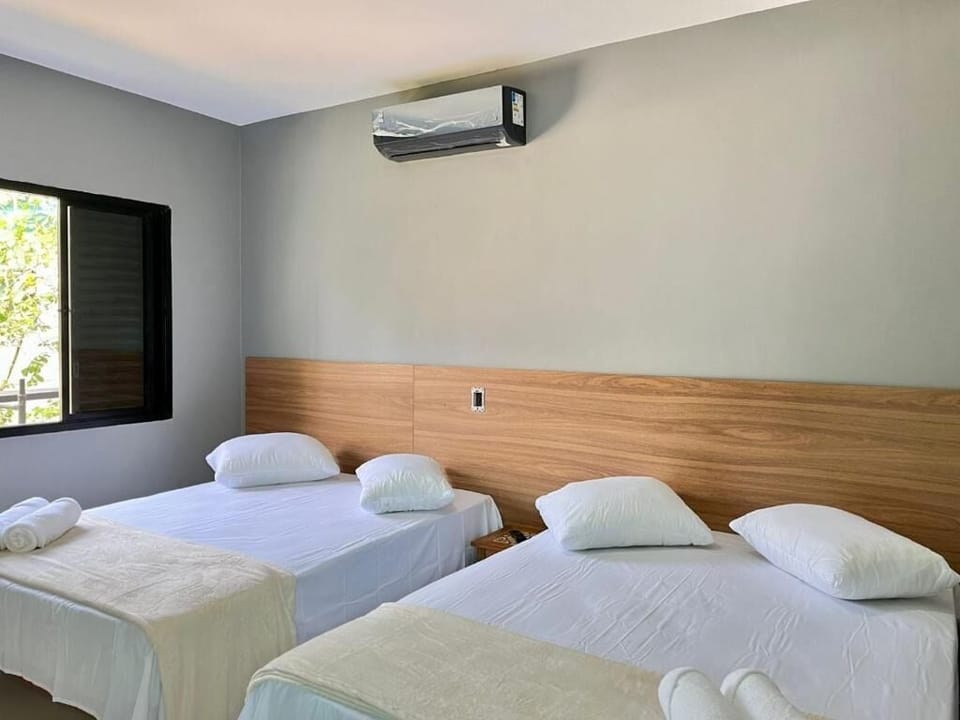 Deluxe Suite | Blackout drapes, iron/ironing board (on request), WiFi (free)