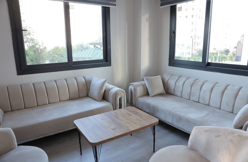Suite, Balcony, Sea View | Living area