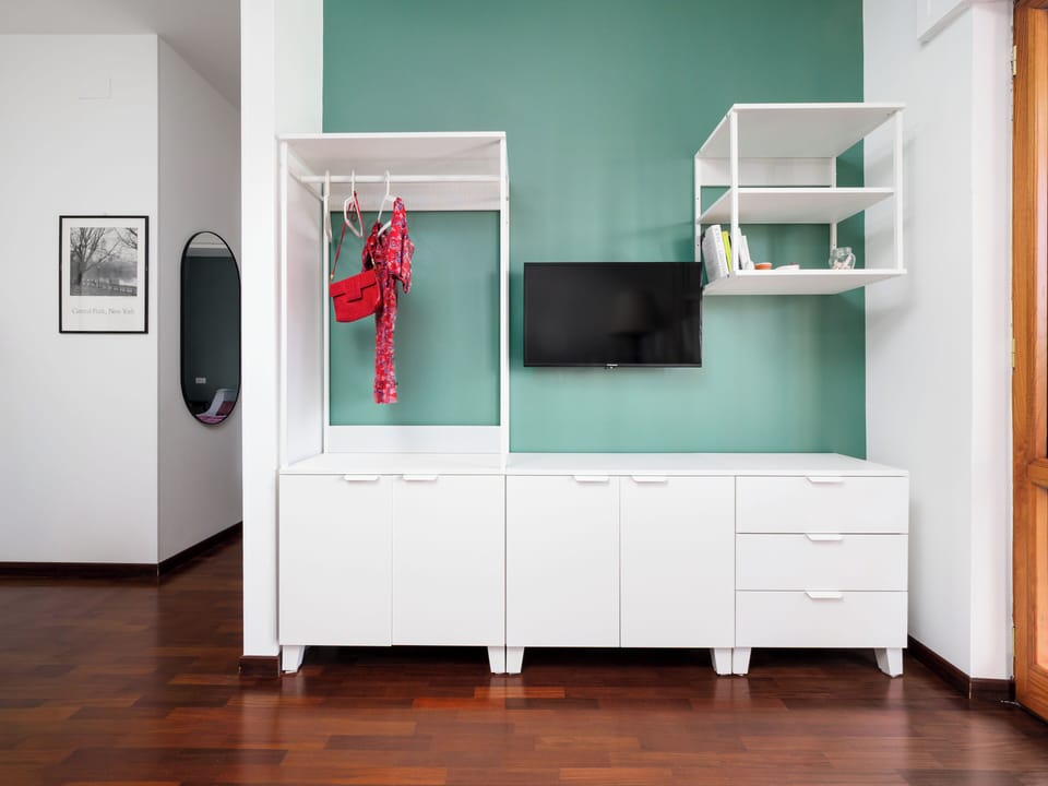 Design Apartment, Balcony, City View | Living area | 40-inch flat-screen TV with digital channels