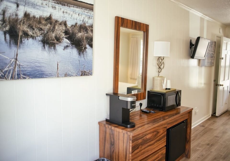 Convenient kitchenette nook with coffee maker, microwave and mini-fridge
