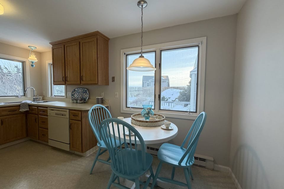 Breakfast nook in the kitchen with seating while looking out over the ocean