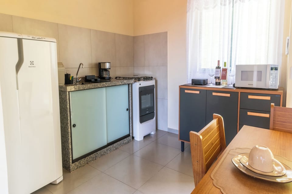 Apartment, City View | Private kitchen | Fridge, microwave, oven, cookware/dishes/utensils