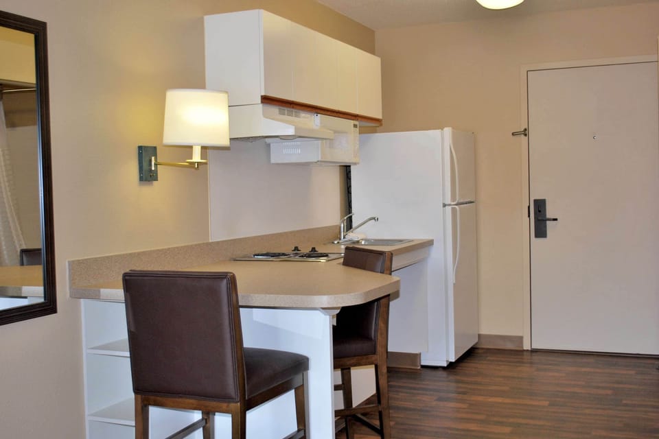 Fridge, microwave, stovetop, coffee/tea maker