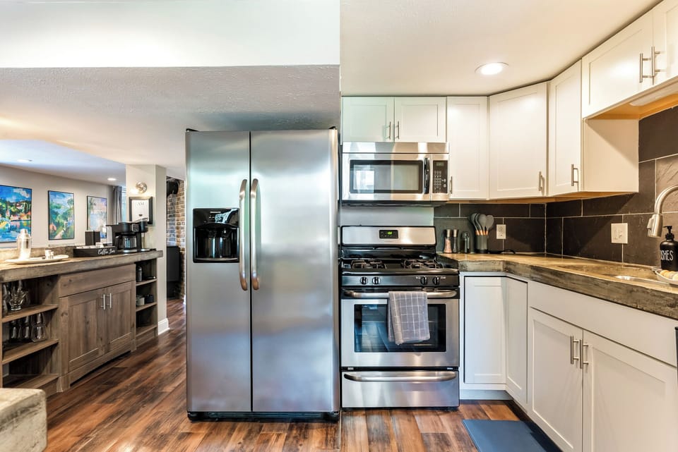 Stock up on groceries for the whole week! The garden suite's kitchen features a large, full-size refrigerator, large pantry and a functional layout that gives small families or business travelers total independence.