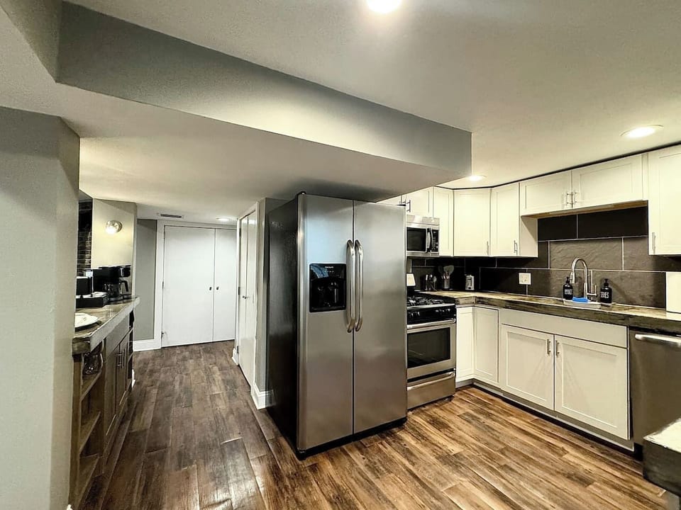 The Garden Level Kitchen includes a pantry and full sized appliances.