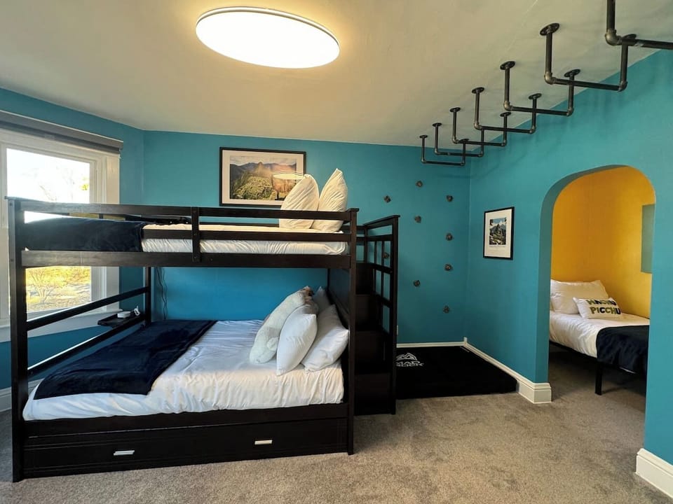 The Machu Picchu Bunk Room is ideal for kids, teens, and families. This Upper Level room sleeps up to 6 people in a Full over Full size bunkbed with a twin trundle bed that pulls out and separate twin bed in its own alcove.