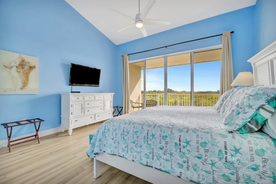 Spacious bedroom with scenic window view