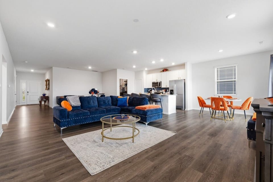Living Room | Navy Sectional Sofa | Open-Concept Kitchen & Dining Area