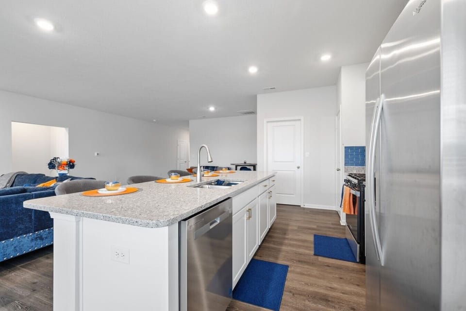 Kitchen | Kitchen Island with Sink | Stainless Steel Appliances & Open Layout