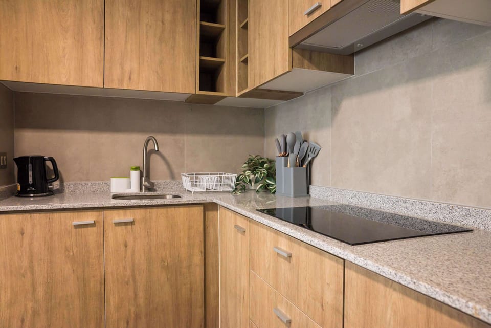 Sleek and modern kitchen with all essentials for a comfortable stay in the heart of Chile.