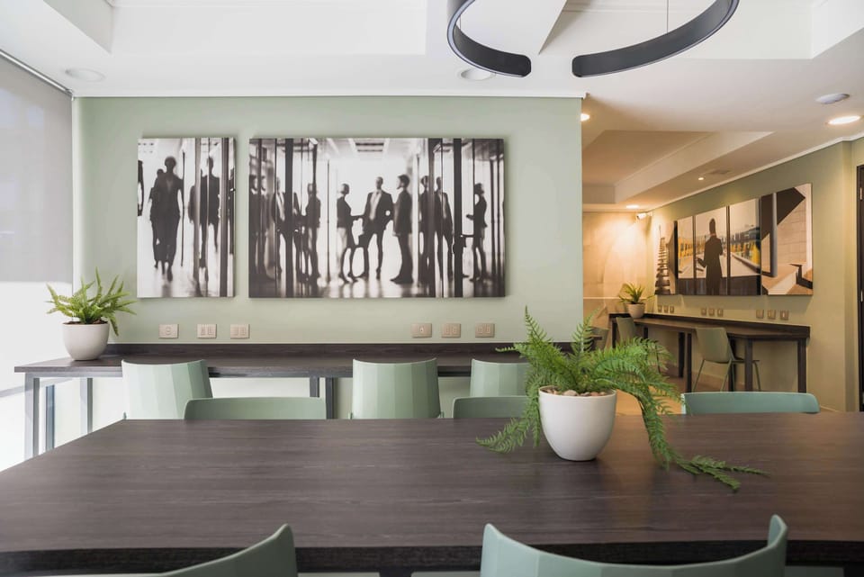 Relax in this stylish lounge area, perfect for socializing or working in a serene environment.
