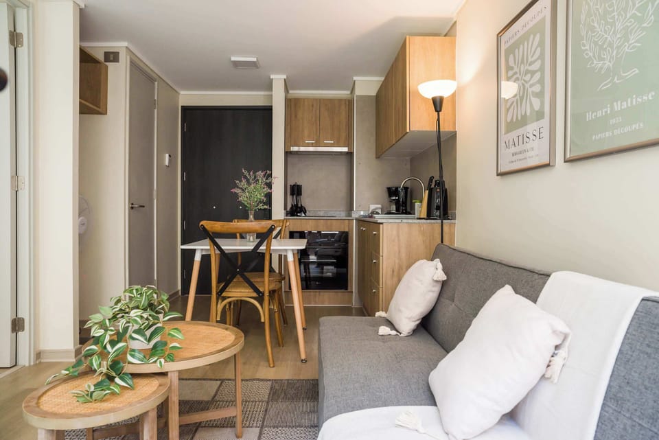 Cozy studio with modern kitchen and stylish decor, perfect for a relaxing stay in the heart of the city.