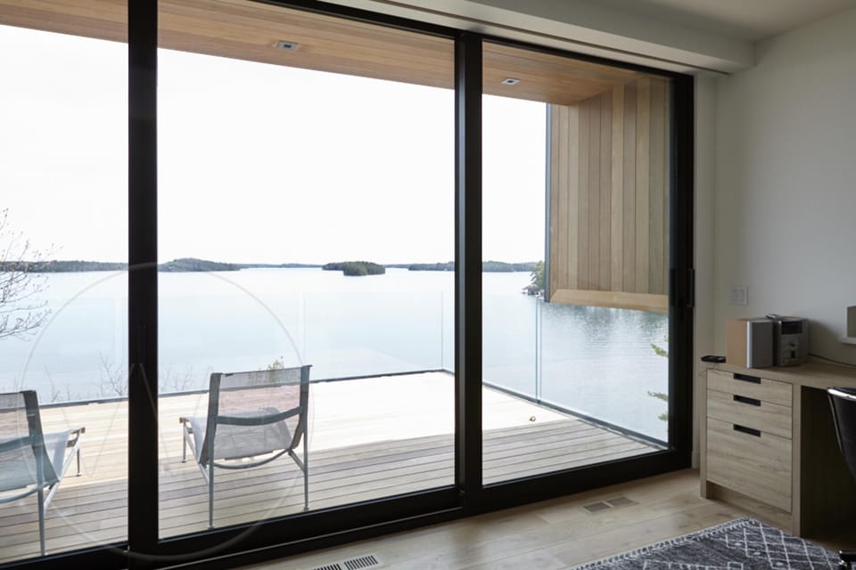 Serene balcony retreat with stunning waterfront views