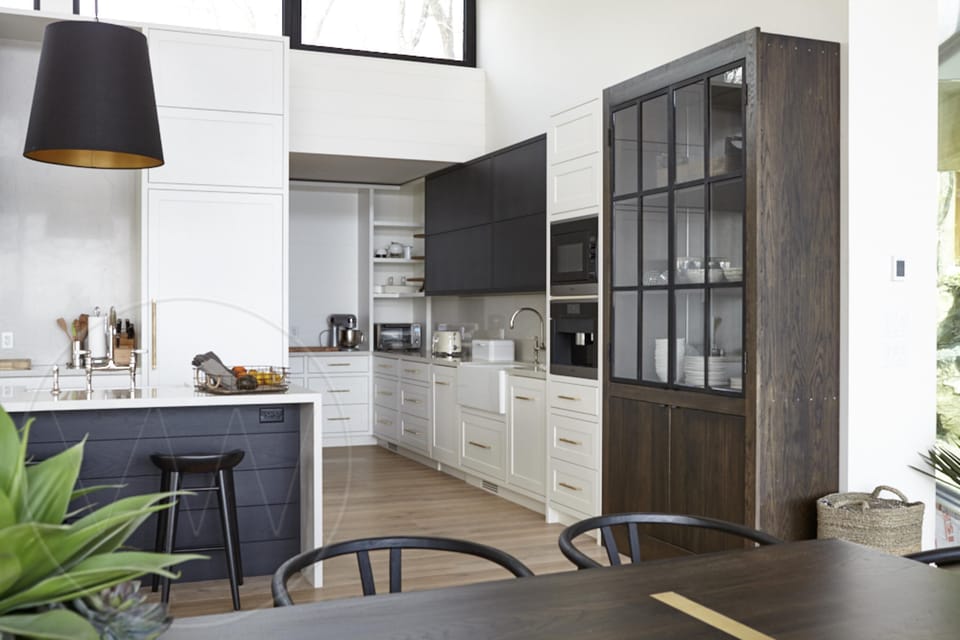 Bright, modern kitchen with sleek cabinetry and cozy dining nook