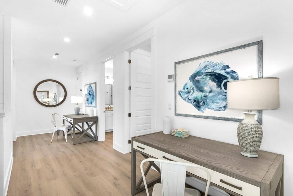 Whimsy's 4th-floor living space includes two desks for attending to work tasks