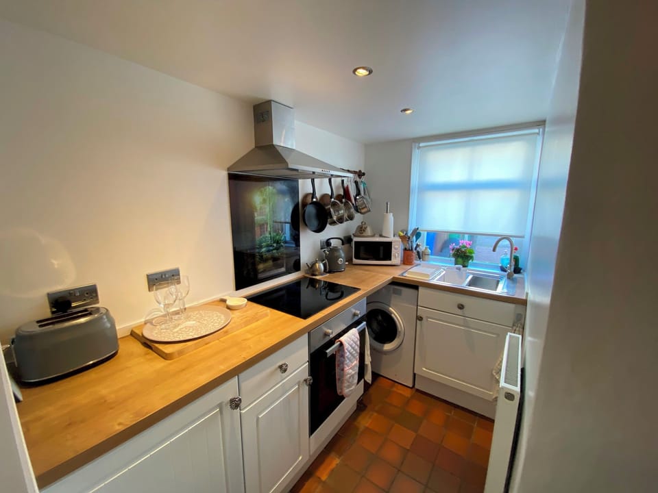 The kitchen is compact but well-equipped