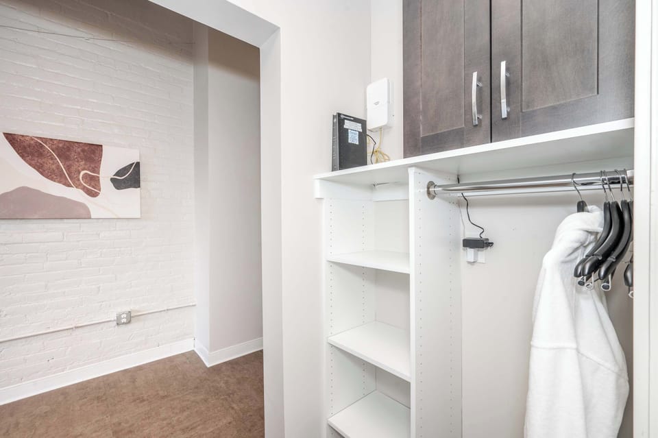 Keep clothes & bags neatly tucked away in Suite 204’s spacious closet​