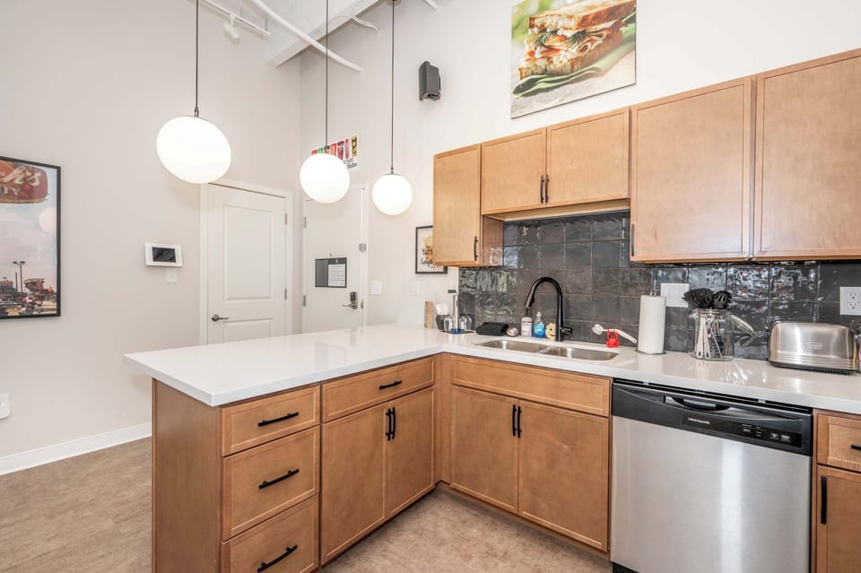 Suite 203’s open kitchen offers ample space & all the comforts of home​