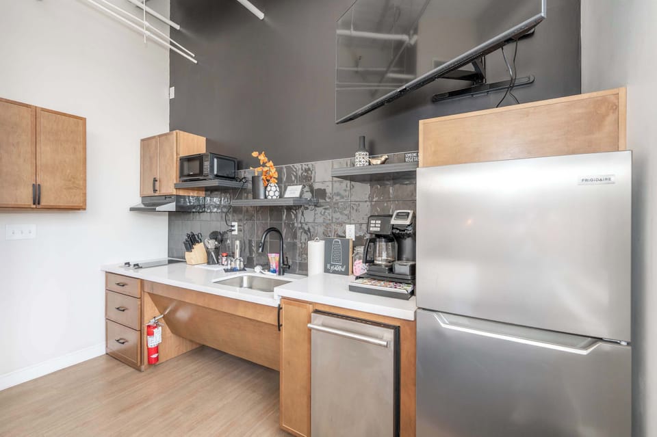 Suite 304’s sleek, open kitchen is equipped for an unforgettable getaway​