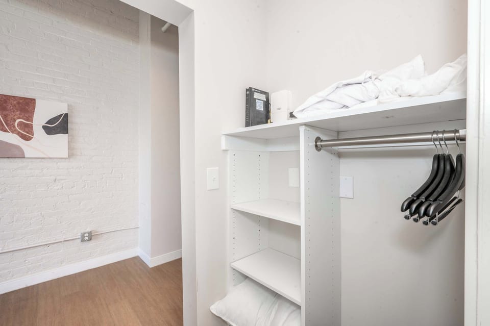 Keep clothes & bags neatly tucked away in Suite 304’s closet​