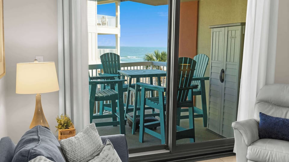 You’ve got a balcony with a beach view right off of your living room. 
