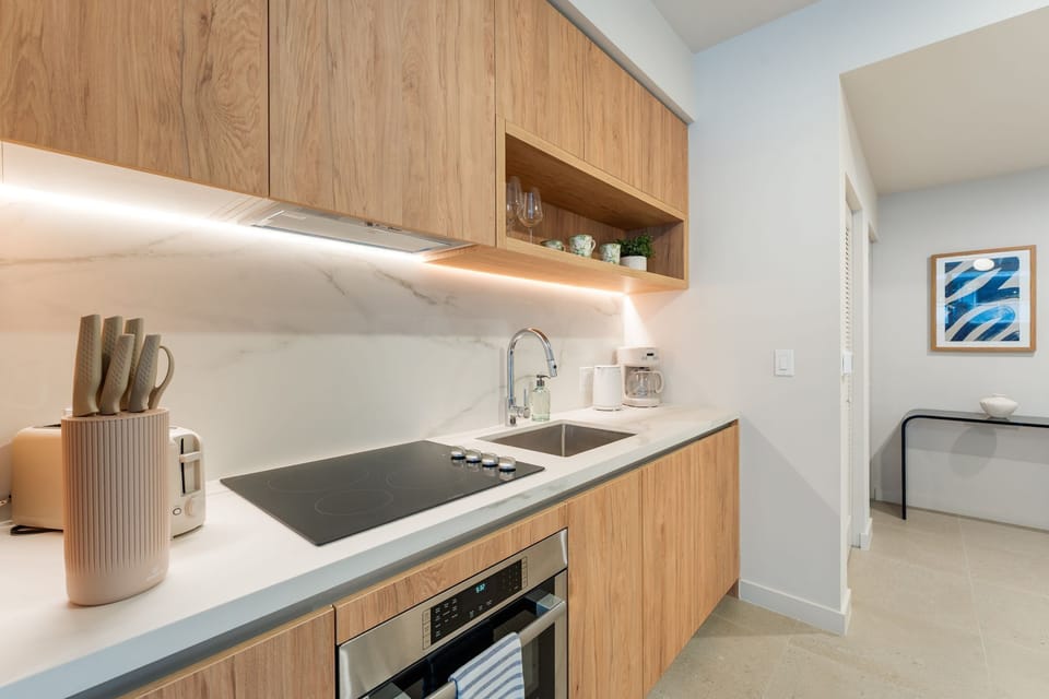 Fully equipped modern kitchen with high-end appliances.