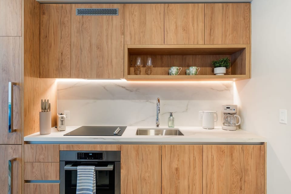 Kitchen detail with sleek cabinetry and modern appliances.