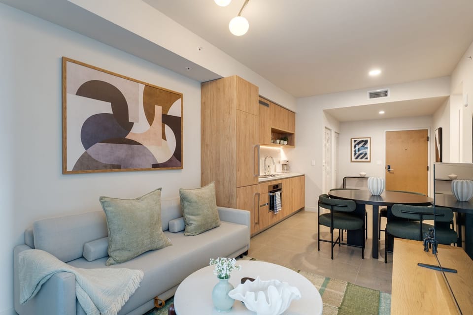 Stylish living room with modern furnishings and seating area.